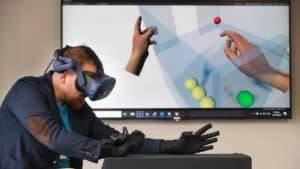 MoCap Pro glove interaction with virtual balls in Unity using the HTC Vive.